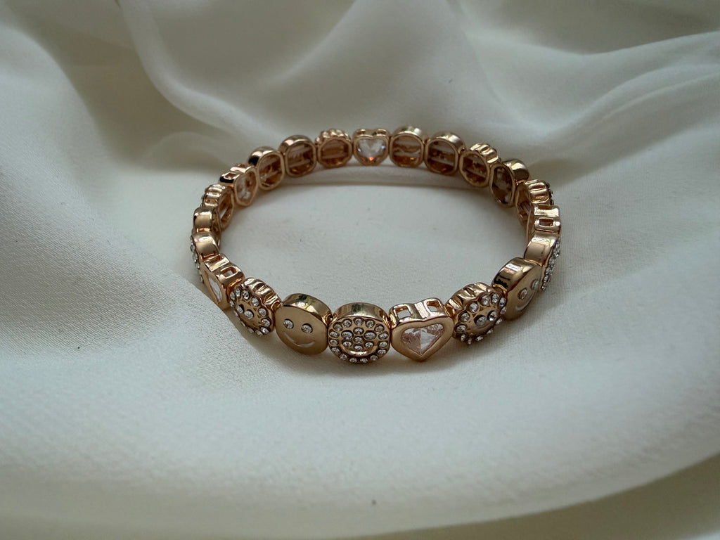 Smiley face and heart bracelet