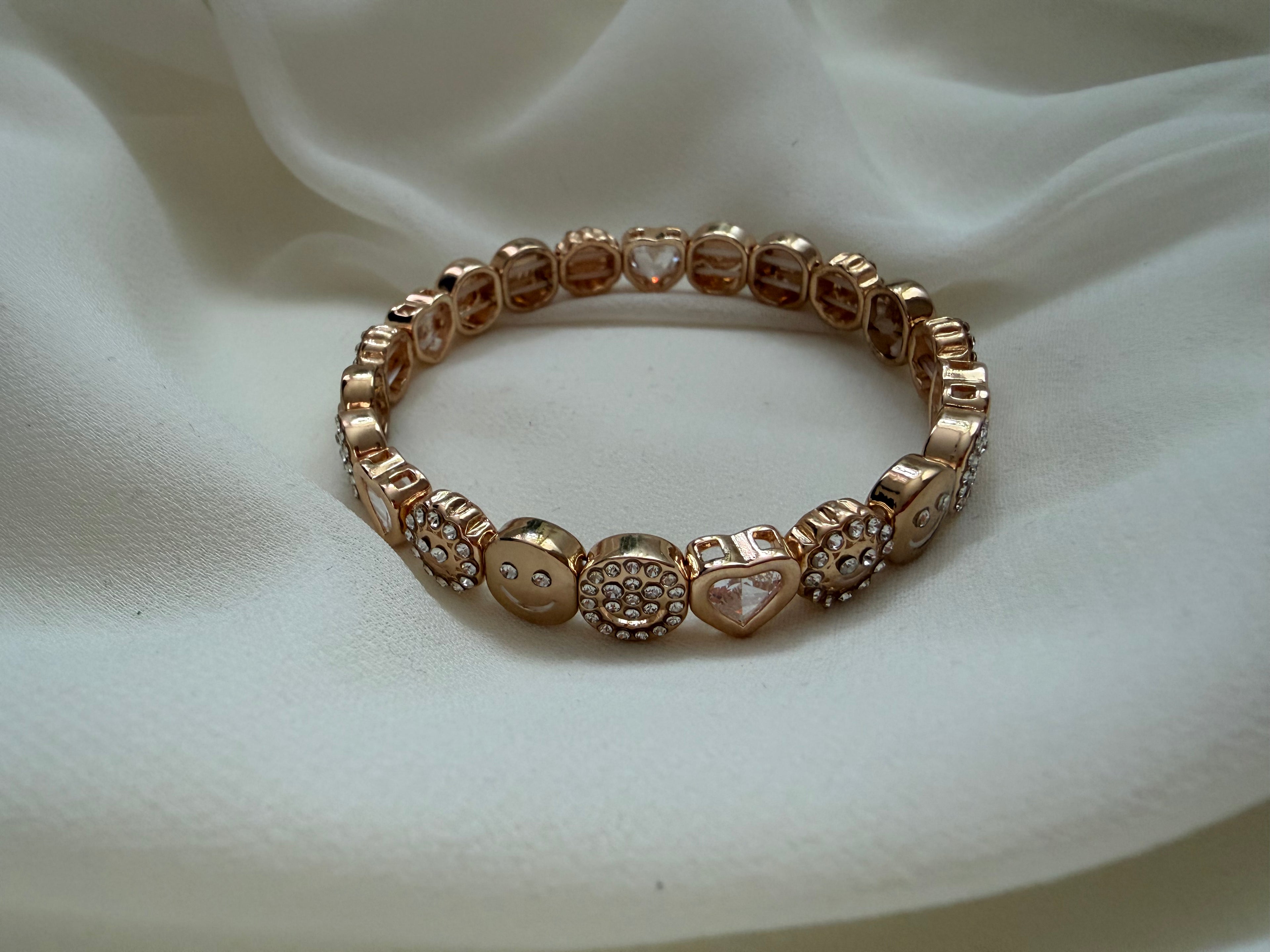 Smiley face and heart bracelet