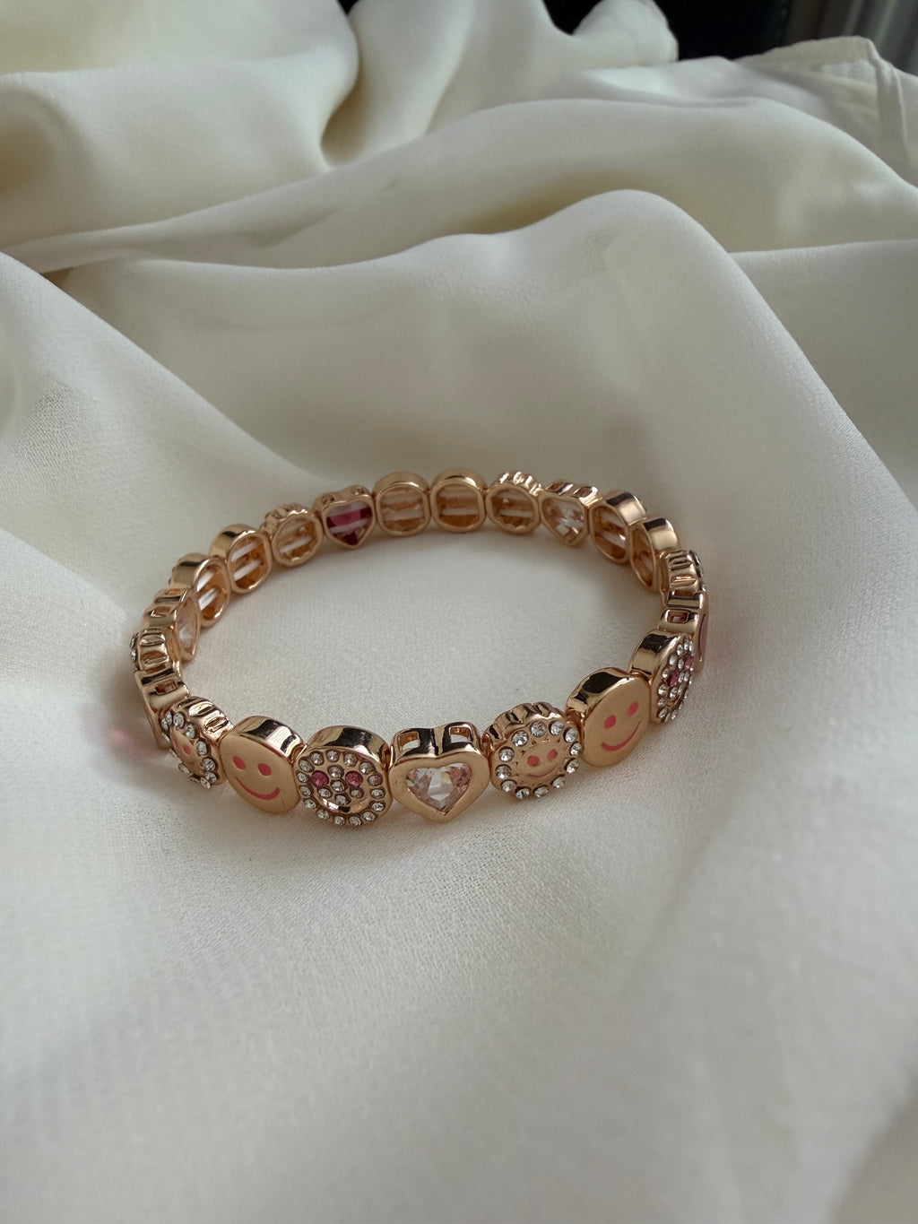 Smiley face and heart bracelet