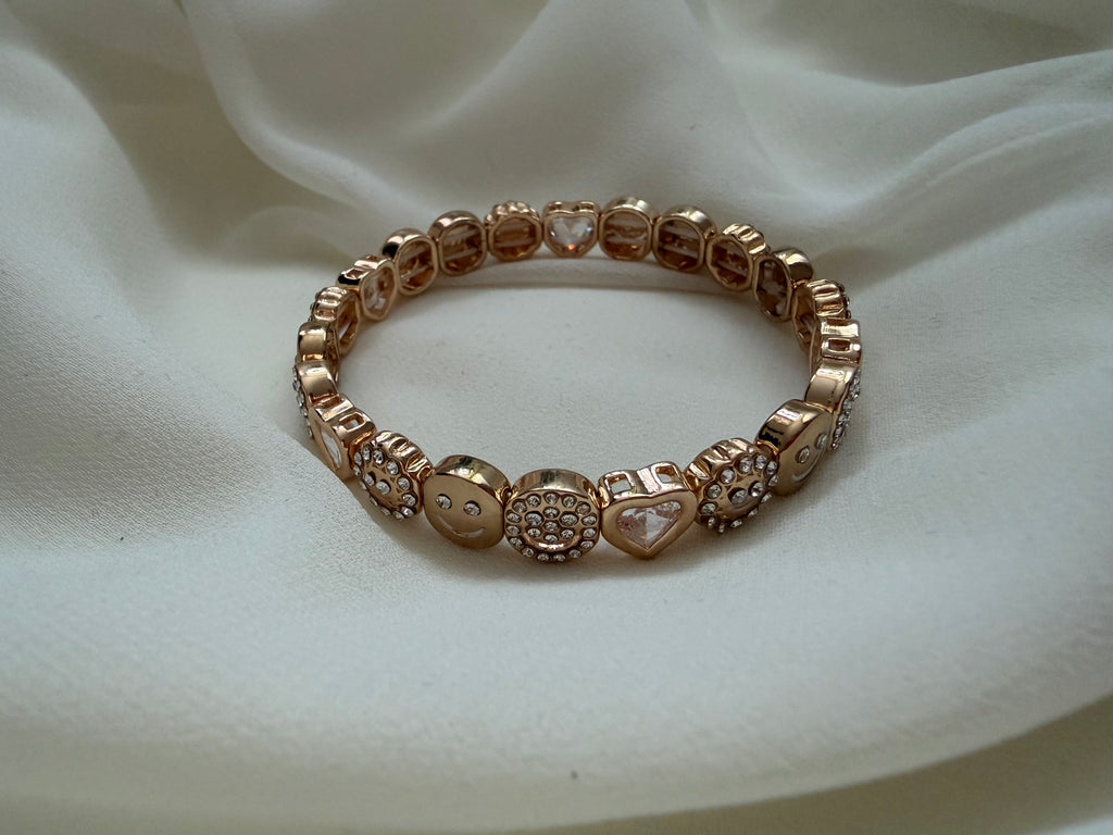 Smiley face and heart bracelet