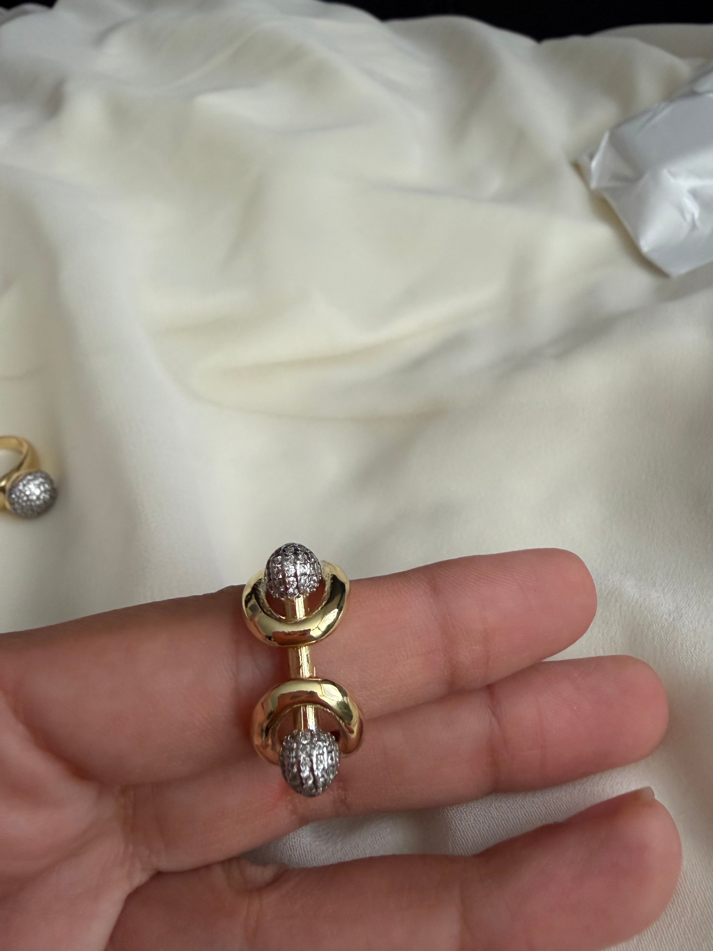 Silver and gold zircon ball ring
