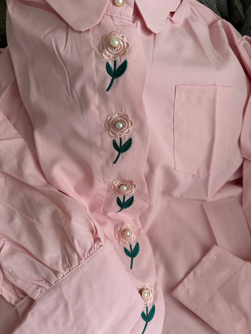 Rose pearl button top